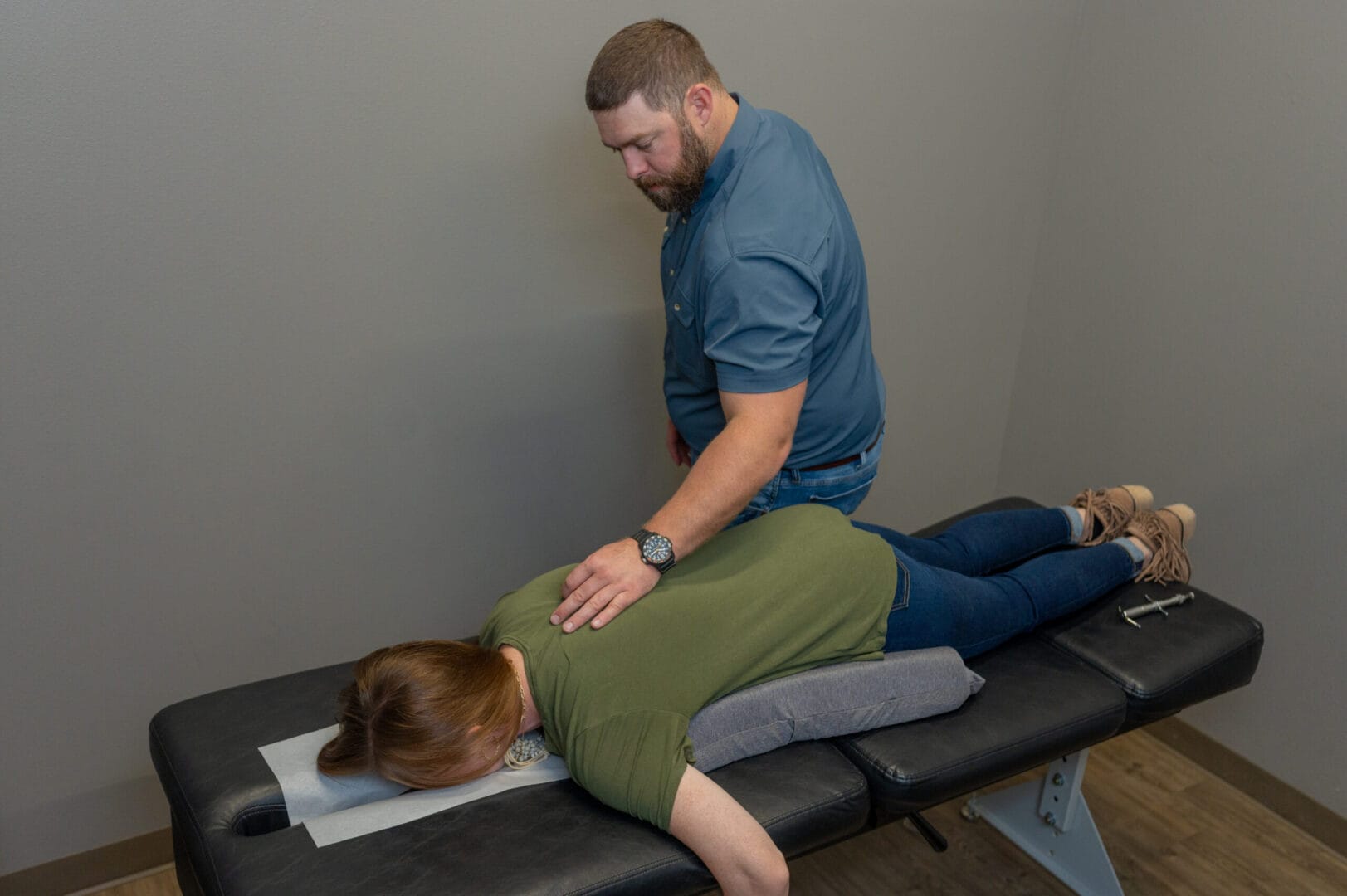 Pregnant woman receiving gentle prenatal chiropractic care at Authority Chiropractic in San Antonio, TX