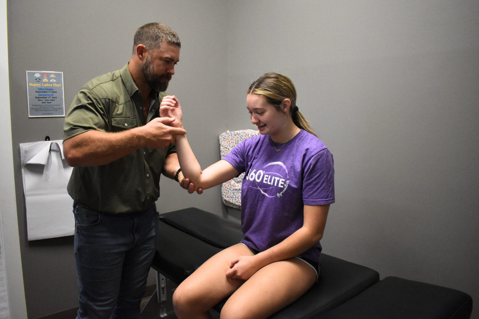 Teen receiving pediatric chiropractic care for posture and sports strain in San Antonio, TX
